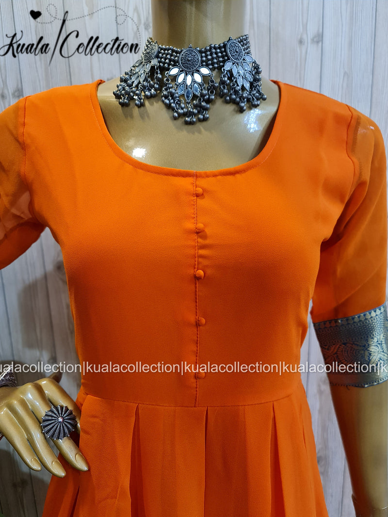 Entrancing Orange Colored  Jacquard Border Georgette Anarkali Gown By Kuala Collection