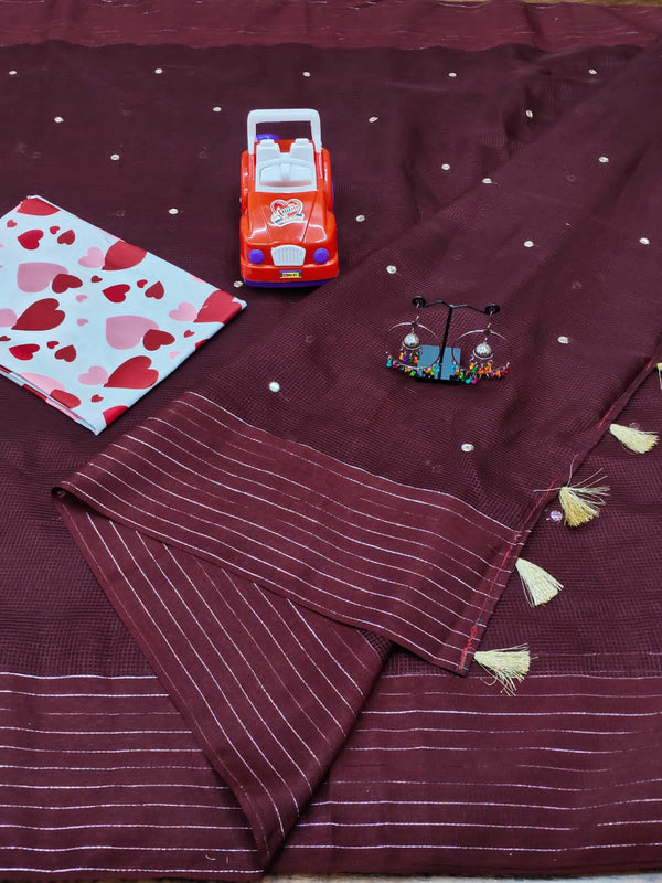 Delightful Wine Colored Saree With Cotton Tessels