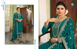 Attractive Teal Colored Bridal Wear Anarkali