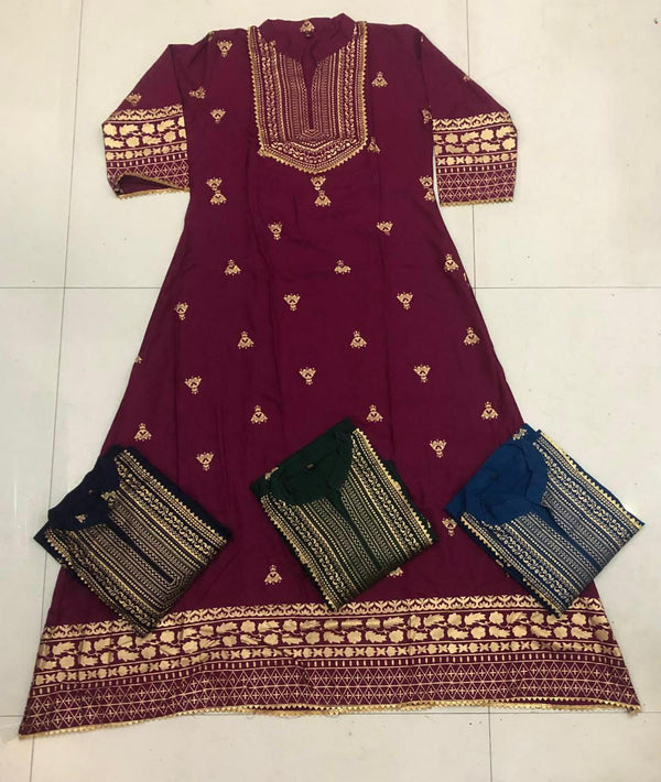 Look Gorgeous by Wearing This Mesmerising Wine Color Kurti Of Heavy Reyon With Lace