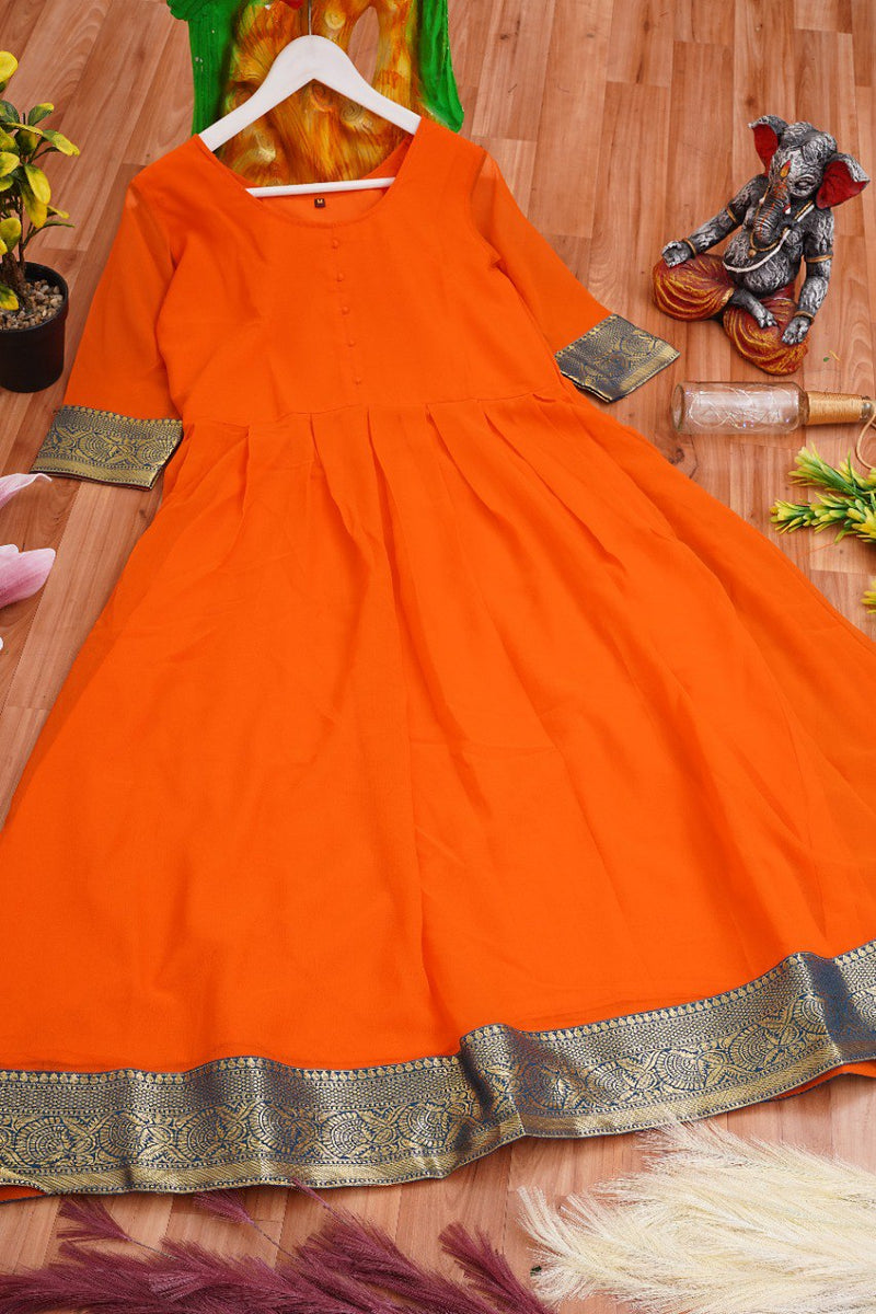 Entrancing Orange Colored  Jacquard Border Georgette Anarkali Gown By Kuala Collection